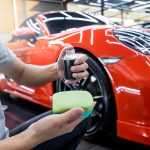 Car,Service,Worker,Applying,Nano,Coating,On,A,Car,Detail
